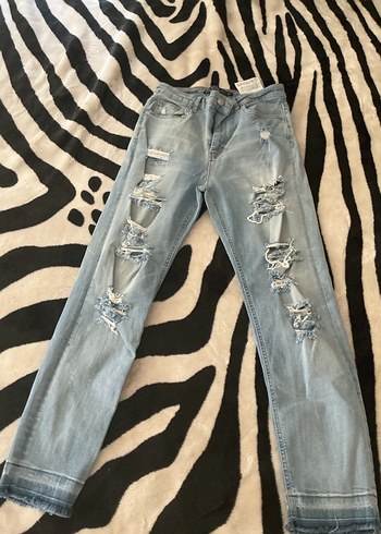 Kadın Yırtık Bol Kesim Midi Denim Pantolon