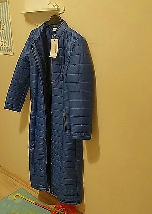Diğer ETİKETİ ÜZERİNDE SICACIK TUTAN ŞİŞME MONT
