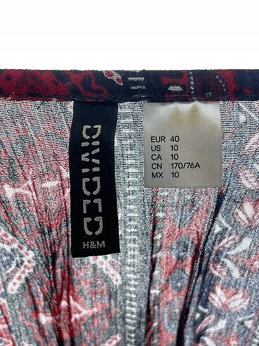 40 Beden çeşitli Renk H&M Kısa Tulum %70 İndirimli.