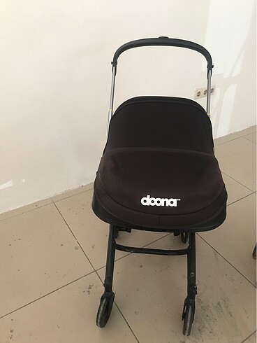 9- 18 kg Beden siyah Renk Orjinal doona bebek arabası