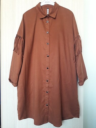 kolları ve arkası püsküllü tunik