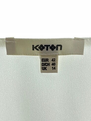 44 Beden beyaz Renk Koton Bluz %70 İndirimli.