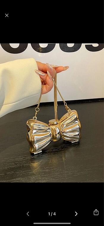 Fiyonklu mini metal Çelik gold çanta