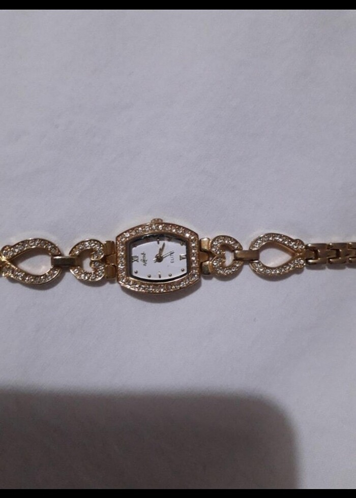 Altın rengi saat - Görsel 3