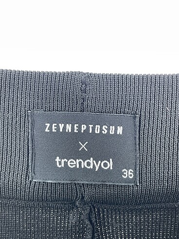 36 Beden siyah Renk Trendyol & Milla İspanyol Paça %70 İndirimli.