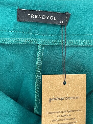 34 Beden yeşil Renk Trendyol & Milla Kumaş Pantolon %70 İndirimli.