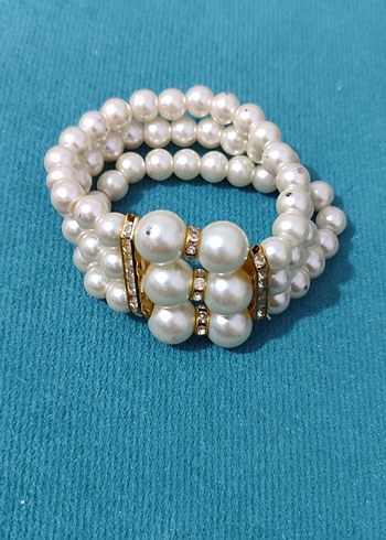 Accessorize inci bileklik kolluk