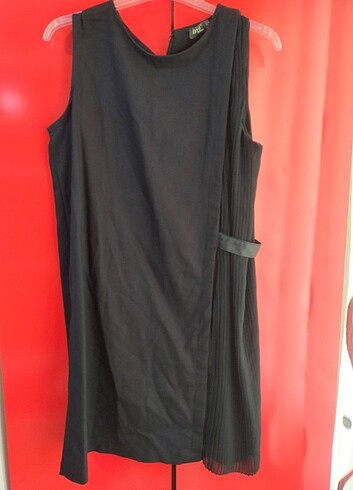 Yanı büzgülü siyah sıfır kol mini elbise