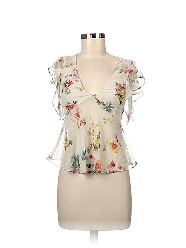 Zara Bluz %70 İndirimli.