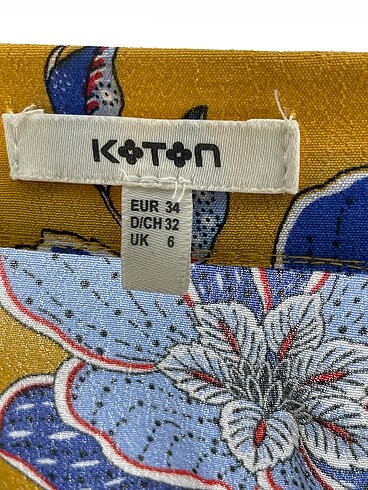 34 Beden çeşitli Renk Koton Midi Etek %70 İndirimli.