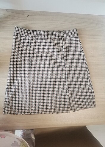Mini yırtmaçlı etek 