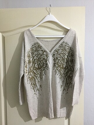 H&M Sırtı melek kanadı desenli triko kazak