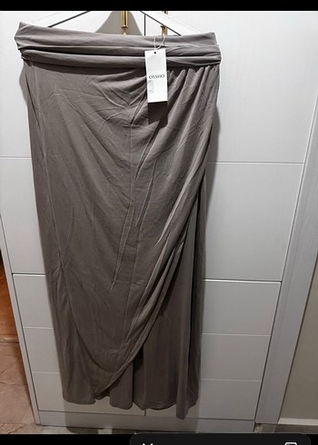 Bej Drapeli Uzun Salaş etek modelinde pantolon