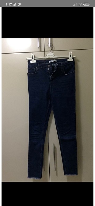 paçası püsküllü kot pantalon