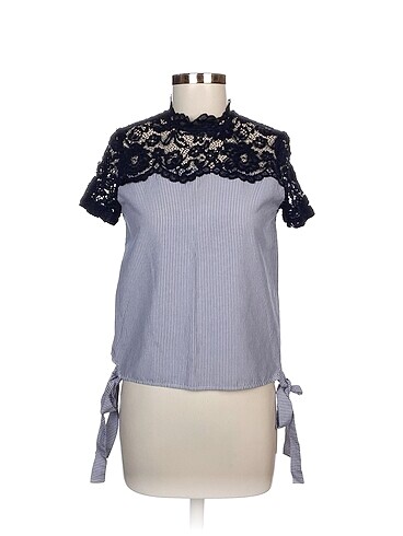 Zara Bluz %70 İndirimli.