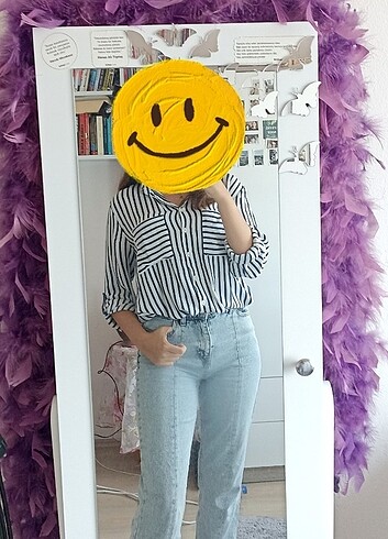 Bilek yırtmaçlı yüksek bel kot pantolon