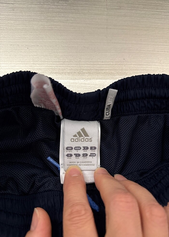 Mavi ve lacivert renkli eşofman takımı - Görsel 3