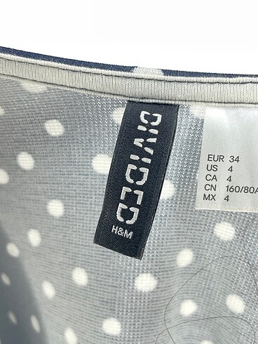 34 Beden çeşitli Renk H&M Kısa Elbise %70 İndirimli.