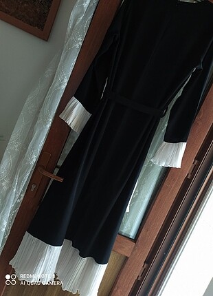 Diğer Siyah bol firlirli şık bir elbise 