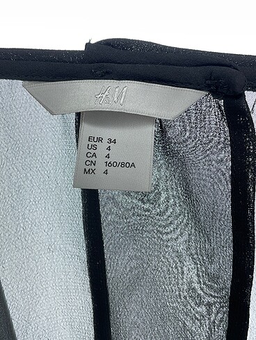 34 Beden siyah Renk H&M Bluz %70 İndirimli.