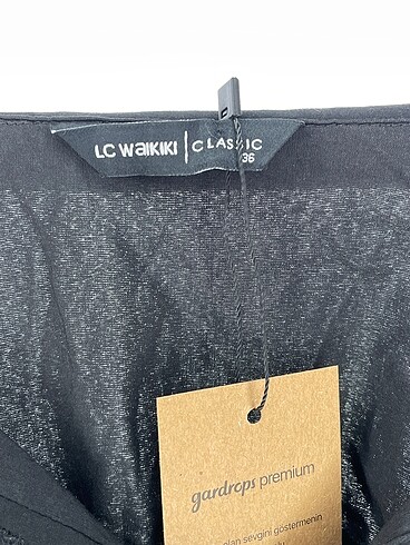 36 Beden siyah Renk LC Waikiki Gömlek %70 İndirimli.