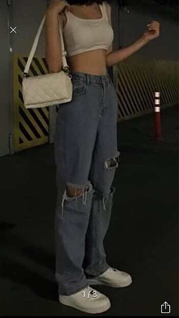 Mavi bol paça yırtık jean