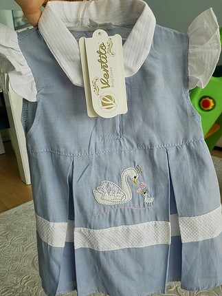 3_6 ay etiketli bebek elbisesi.ventito kugu nakisli, dokuma.kuma