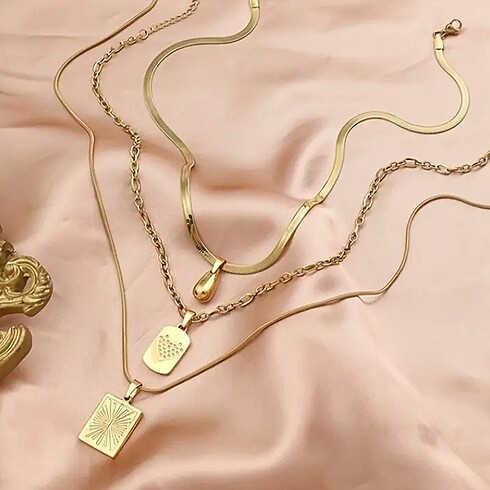 Beden Üçlü kolye set gold renkli çelik üründür