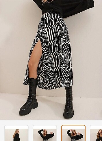 Beli lastikli yirtmacli zebra etek