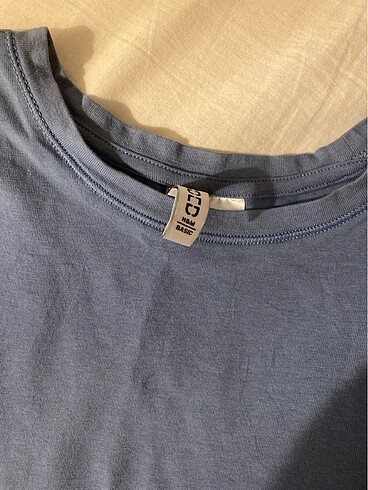H&M Hm bedene oturan baby tee