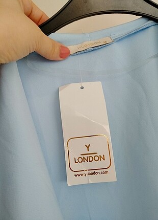 38 Beden mavi Renk Y-London trenç serisi ürünüdür 38 beden geniş salaş kalıbı var e