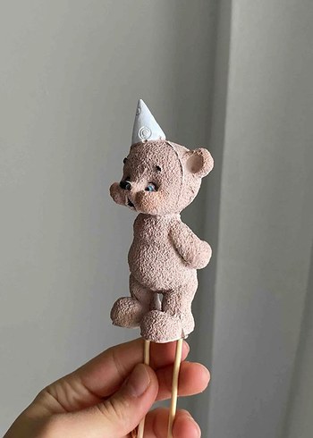 Mum üfleyen ayı - Görsel 3