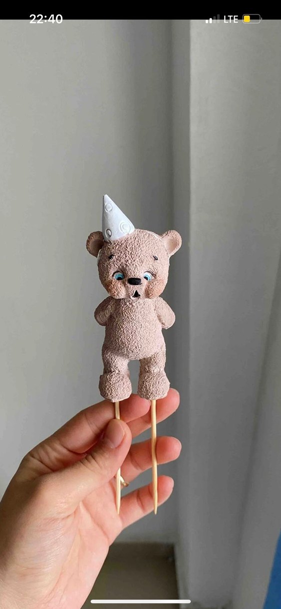 Mum üfleyen ayı - Görsel 2