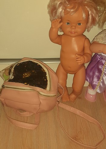 Beden Pastel Mor Elbise Giyen Bebek