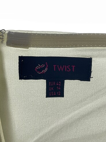 42 Beden beyaz Renk Twist Bluz %70 İndirimli.
