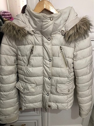 Krem şişme mont