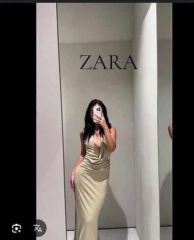 SATILDI Kabuk detaylı halter yaka elbise