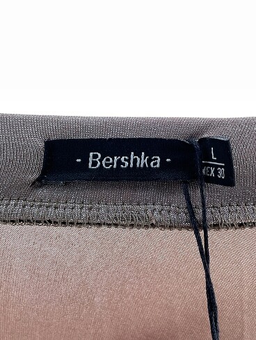 l Beden pembe Renk Bershka Midi Etek %70 İndirimli.