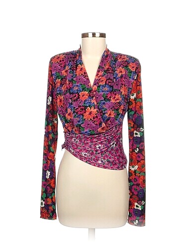 Zara Bluz %70 İndirimli.