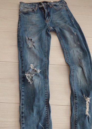 Kadın Mavi Yırtık Dar Kesim Kot Pantolon