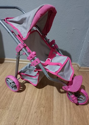 Pembe ve gri bebek arabası - Görsel 2