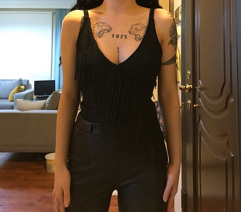 Püsküllü body