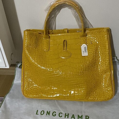 Longchamp canta