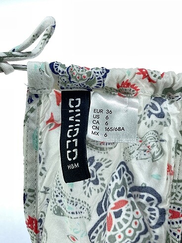36 Beden çeşitli Renk H&M Kısa Tulum %70 İndirimli.