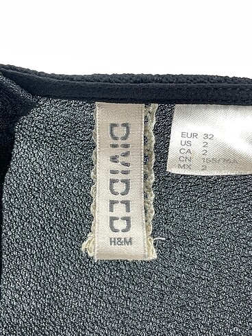 32 Beden siyah Renk H&M Kısa Elbise %70 İndirimli.