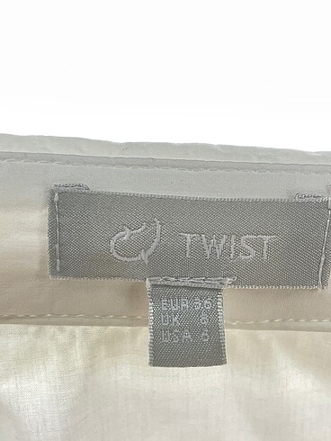 36 Beden beyaz Renk Twist Gömlek %70 İndirimli.