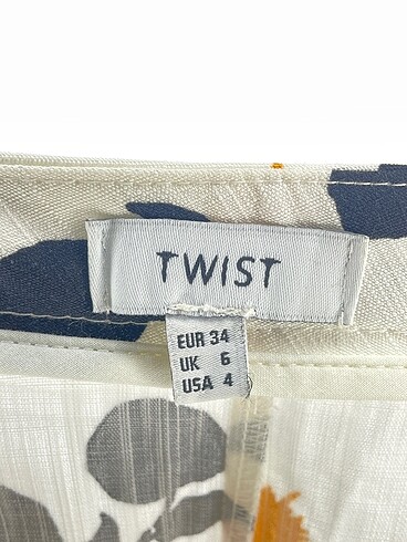 34 Beden çeşitli Renk Twist Düz Kesim %70 İndirimli.