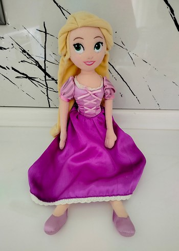 Mor Elbise Giymiş Bebek Oyuncak