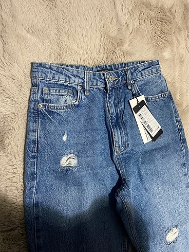 yeni etiketli jean