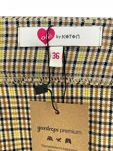 36 Beden çeşitli Renk Koton Mini Etek %70 İndirimli.